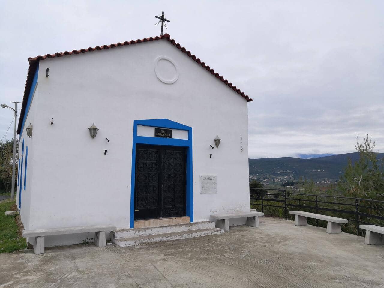Entrance view of a blue and white chapel